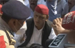 Akhilesh Yadav sits in protest outside home over death of 8 in violence